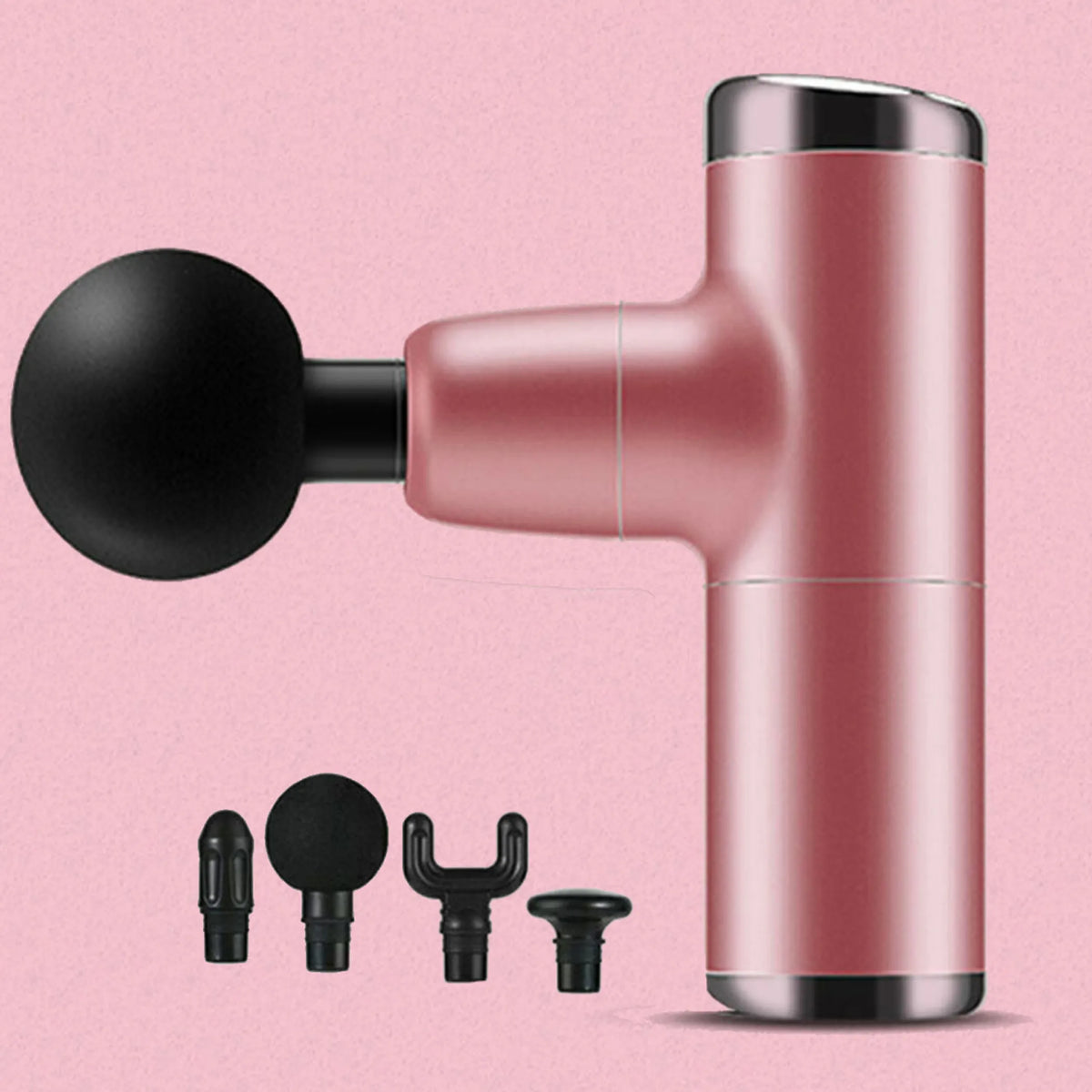 No More Sore mini massage gun in pink with its four interchangeable massage heads