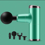 No More Sore mini massage gun in teal green with its four interchangeable massage heads