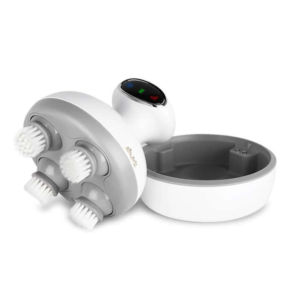 Armona massager tipped on its side with brush heads attached, next to its charging base