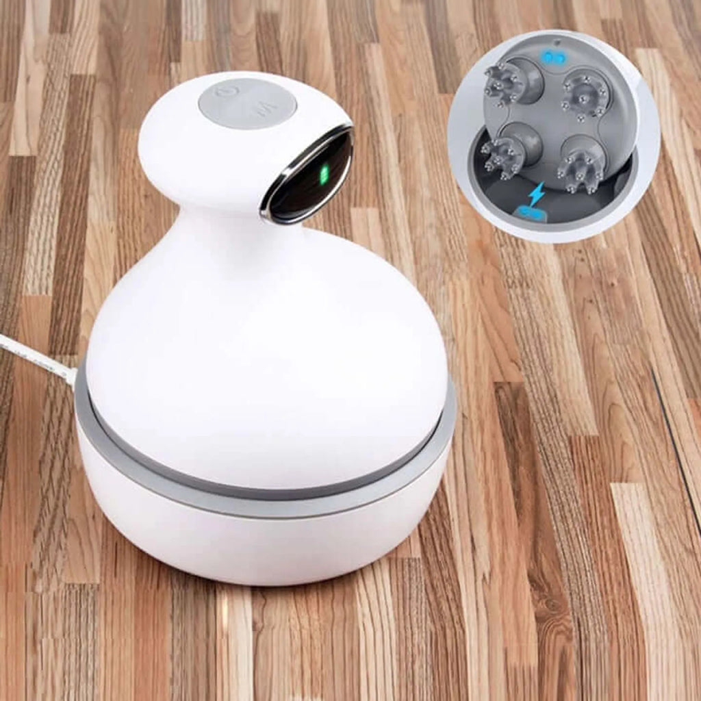 Armona massager on its charging base on a wood floor, with a close-up of the massage heads