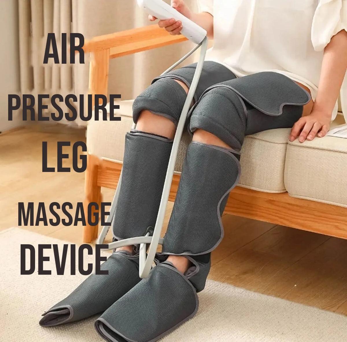Woman seated on a sofa wearing gray air compression boots on both legs, with the words air pressure leg massage device