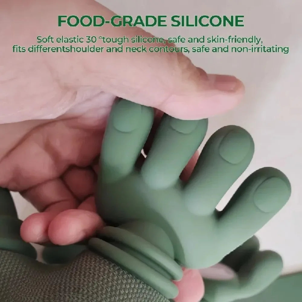 Close-up of a hand pressing the soft green silicone fingers of the neck massager to show how flexible they are