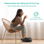 Woman relaxing in a chair with a cup of tea while using the foot massager, with a 15 minute timer icon