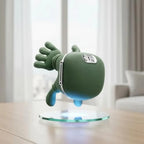 Green heated bionic neck massager standing on a glass display, showing its control buttons and silicone fingers