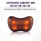 Brown massage pillow with its four kneading heads glowing