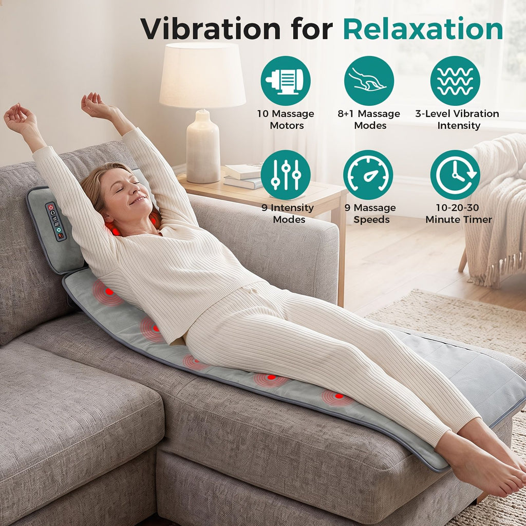 Woman stretching on a sofa while lying on the gray massage mat, with icons for 10 motors, massage modes, intensity, speeds and a 10 to 30 minute timer