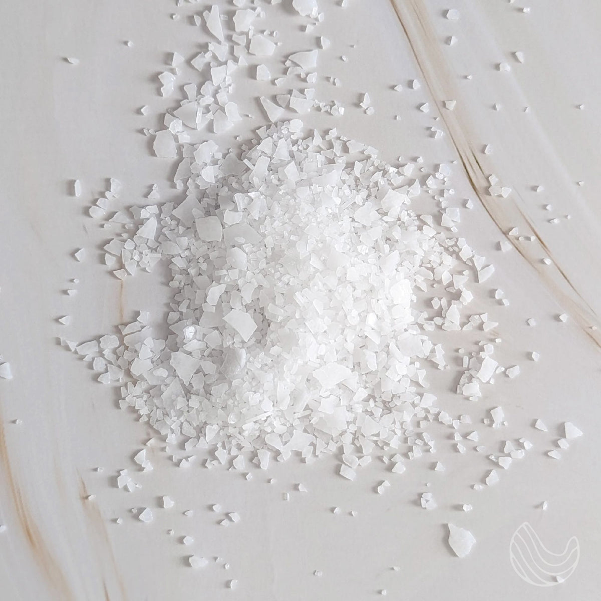 Pile of white Dead Sea magnesium flakes