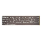 Ingredient label: sunflower seed oil, jojoba oil, rice bran oil, grapeseed oil and vitamin E