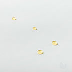 Drops of Innatus Breathe essential oil on a white surface