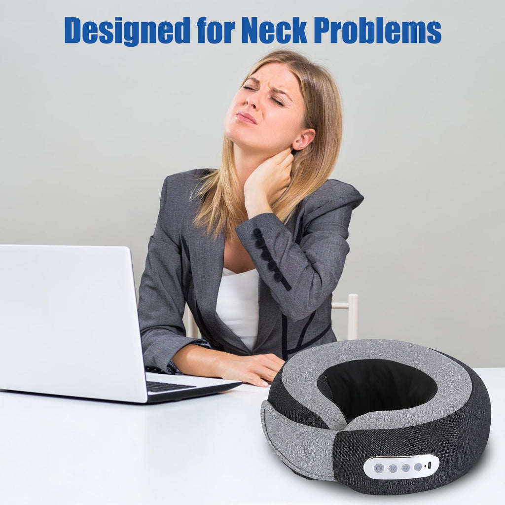 Woman at a laptop rubbing her neck, beside the gray neck pillow